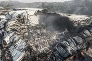 Destroyed: The remains of the Amcor Flexibles packaging plant on the outskirts of Durban. By MARCO LONGARI AFP
