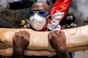 Down with Burhan's rule, crowds chanted, with protests and violence flaring in both the capital Khartoum and its suburbs, including the twin city of Omdurman, on the other side of the Nile river. By - AFP