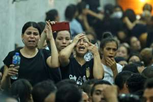 Egyptian mourners at the funeral of victims killed in the Coptic church fire, at the Church of the Blessed Virgin Mary in Imbaba district in the west of greater Cairo. By Khaled DESOUKI AFPFile