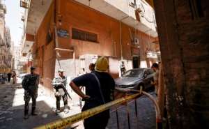 Egyptian police gather outside the Abu Sifin church after the blaze blamed on an electrical fault. By Khaled DESOUKI AFP