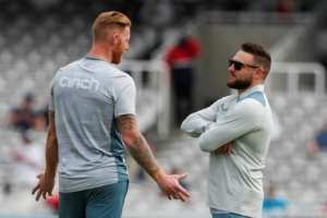 England Test captain Ben Stokes left talks to coach Brendon McCullum. By Ian Kington AFP
