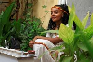Ethiopian Reem Suhail, wearing a headband in the colours of Tigray's flag, takes part in the Ashenda celebrations. By ASHRAF SHAZLY AFP