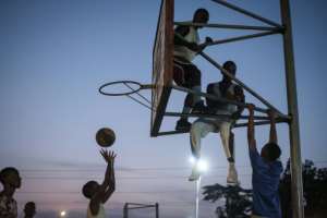 Exercise clubs host fitness sessions on basketball courts and other public areas. By Yasuyoshi Chiba AFP