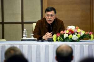 Fayez al-Sarraj, head of Libya's Government of National Accord, will participate in a peace conference on Libya in Berlin, but his rival Khalifa Haftar has not confirmed his attendance. By Mahmud TURKIA AFP