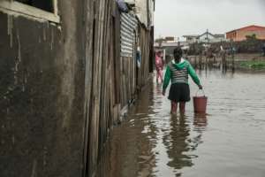 Floods swept through exposed neighbourhoods in Antananarivo. By RIJASOLO AFP