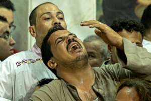 Funerals were held in two Cairo churches for 41 victims of the fire that ripped through a Coptic Christian church during Sunday mass. By Khaled DESOUKI AFP