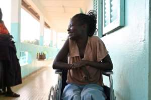 Gisele Abena is in a wheelchair because leprosy has eaten away at her feet. By Issouf SANOGO AFP