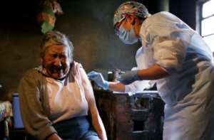 If she can do it... Ana Lucia Palacios receives a dose of Sinovac Covid-19 vaccine in Bogota. By Leonardo Munoz AFP