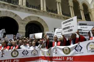 Judges gather for a protest against Tunisia's President Kais Saied outside the Tunis Palace of Justice in Tunisia's capital on June 23. By FETHI BELAID AFP