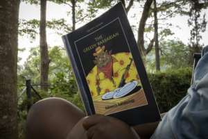 Kakwenza Rukirabashaija's novel 'The Greedy Barbarian' describes high-level corruption in a fictional country. By KATUMBA BADRU SULTAN AFPFile