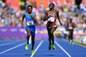 Kenya's Abraham Kibiwot right beats India's Avinash Mukund Sable to gold in the men's 3000m steeplechase at the Commonwealth Games. By Glyn KIRK AFP