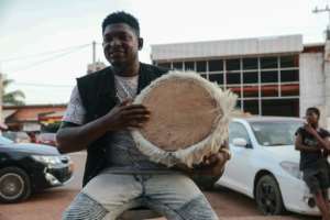 Lasto, 20, is a professional djembe player. By Daniel Beloumou Olomo AFP