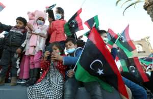 Libyans gather in Tripoli on February 18, 2022 for the 11th anniversary of the uprising that toppled longtime strongman Muammar Kadhafi. By Mahmud Turkia AFPFile