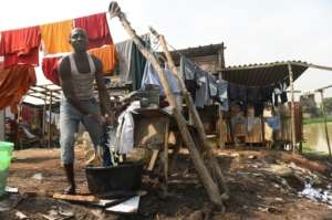 Living conditions for many remain dire, with half of Nigeria's 200 million people living in extreme poverty. By PIUS UTOMI EKPEI AFP