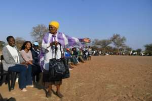 Long lines formed at polling stations in Wednesday's vote. By Monirul Bhuiyan AFP