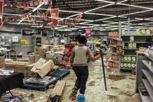 Looting and rioting has erupted in Zuma39;s home region KwaZulu-Natal as well as Gauteng province, claiming more than 200 lives. By MARCO LONGARI AFP