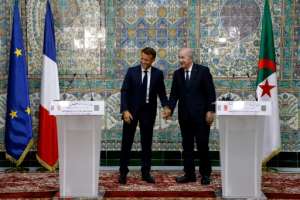 Macron L, announced a new page in ties with Algeria, whose President Abdelmadjid Tebboune R is pictured with him at a joint press conference on August 25, 2022. By Ludovic MARIN AFP