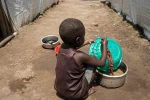 Missing school: Some 65 percent of those displaced by the lake are children. By Yasuyoshi CHIBA AFP