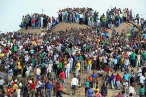 Mourners gather in Marikana on August 23, 2012, to remember those killed during the strike. By - AFPFile