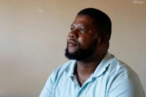 Mzoxolo Magidiwana, 34, was shot nine times but survived. By Phill Magakoe AFP
