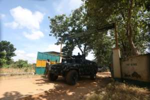 On guard at the outside gate of Nigeria's Kuje prison after suspected Boko Haram gunmen attacked the facility. By Kola Sulaimon AFPFile