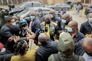 On the campaign trail: President Cyril Ramaphosa talks to reporters during a visit to Soweto. By LUCA SOLA AFP
