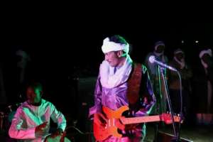 Oumara Moctar, also known as Bambino, performing at the Chiriet dunes northeast of Iferouane. By Souleymane Ag Anara AFP