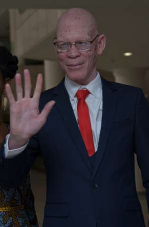 Overstone Kondowe is the first albino to win a seat in Malawi's parliament after years of discrimination and killing. By AMOS GUMULIRA AFP