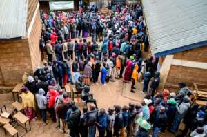 People began queuing before dawn to vote.  By Gordwin Odhiambo AFP