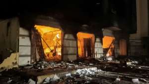 Protesters ransack the Libyan parliament building's offices and set fire to some of them after breaking through the perimeter on Friday evening. By - AFP