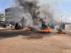 Protesters set up barricades which they set on fire in the capital Ouagadougou. By OLYMPIA DE MAISMONT AFP