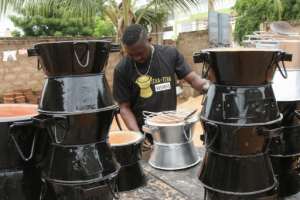 Rodolphe Teko makes ovens designed to reduce use of charcoal -- a resource that is driving deforestation. By Matteo FRASCHINI KOFFI AFP