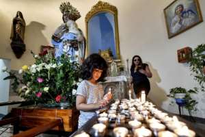 Rresearchers of Italian origin say the procession is an echo of a 'forgotten history' that offers a model for coexistence with migrants of various faiths and ethnicities. By FETHI BELAID AFP