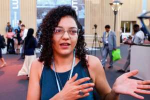 Sanaa Seif, sister of imprisoned British-Egyptian activist Alaa Abdel Fattah, speaks to reporters on the sidelines of the COP27 climate conference: she said the dissident stopped drinking water on Sunday. By JOSEPH EID AFP