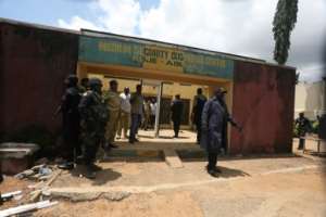 Security officials at Kuje prison in Abuja. By Kola Sulaimon AFPFile