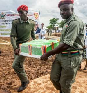 Several huge cakes were a centrepiece of the occasion, even as the country's economy collapsed and food shortages worsened for millions. By Jekesai NJIKIZANA AFPFile