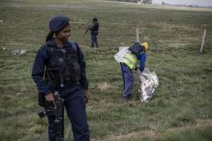 South African police have scaled up crime-busting stop-and-search operations, including weeding out undocumented migrants. By MARCO LONGARI AFP