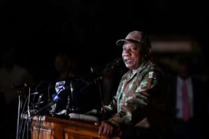 South African President Cyril Ramaphosa saw off soldiers before they deployed from a military base in Soweto township. By - AFP
