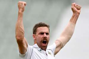 South Africa's Anrich Nortje celebrates dismissing Australia's David Warner. By William WEST AFP