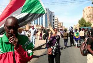 Sudanese demonstrators rallied against an October 25 coup launched by military leader General Abdel Fattah al-Burhan, shouting power to the people. By - AFP