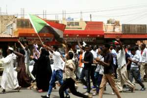 Sudanese protesters chant Civilian rule during a mass demonstration against Sudan's ruling generals in the northern Khartoum district of Bahri. By Ebrahim Hamid AFP