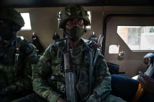 Support: A Rwandan soldier on patrol in Mozambique's troubled Cabo Delgado province. By Kun TIAN AFP