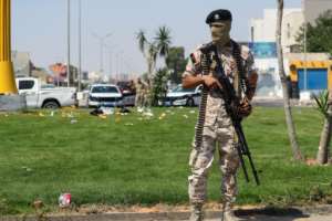 Tensions have been rising for months as two prime ministers vie for power in the North African country -- here a 444 Brigade member mans his position. By Mahmud TURKIA AFP