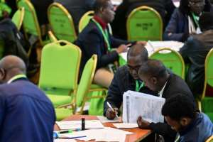 The election commission is under heavy pressure to deliver a clean poll and release results by Tuesday. By Tony KARUMBA AFP