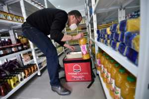 The firm has branched out into deliveries of fast food and groceries, with sister app Yassir Express. By RYAD KRAMDI AFP