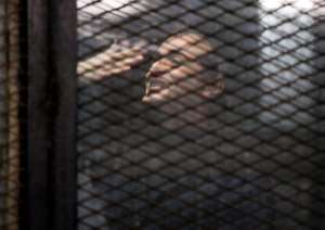 The poetry of Egyptian activist Ahmed Douma, seen here during a trial hearing in January 2019, was briefly exhibited at this year's Cairo book fair before being pulled. By - AFPFile