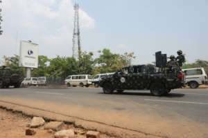 The risk of electoral violence and a lack of cash in Nigeria due to a recent currency swap could discourage residents from voting. By KOLA SULAIMON AFP