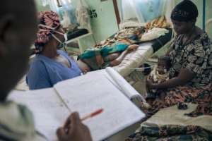The surgeons, anaesthetists and nurses working in the hospital find little rest. By ALEXIS HUGUET AFP