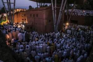 Thousands gathered before dawn to attend celebrations. By EDUARDO SOTERAS AFP