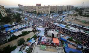 Thousands of Egyptians demanding the restoration of ousted Islamist president Mohamed Morsi had joined the protest camp in Cairo's Rabaa al-Adawiya Square which was bloodily broken up by troops and riot police. By FAYEZ NURELDINE AFPFile